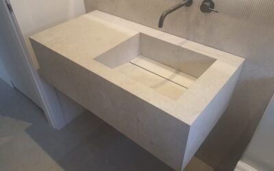 Proyecto de lavabo integrado en porcelánico con canal registrable en Barcelona